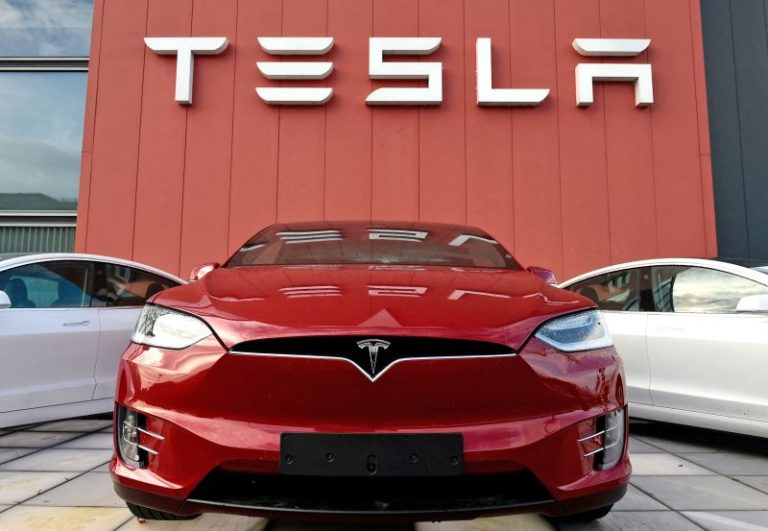 Tesla shares tumble following deliveries report