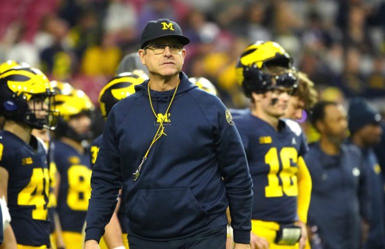 Harbaugh leads way as college football coaches earn $12.7M in bonuses