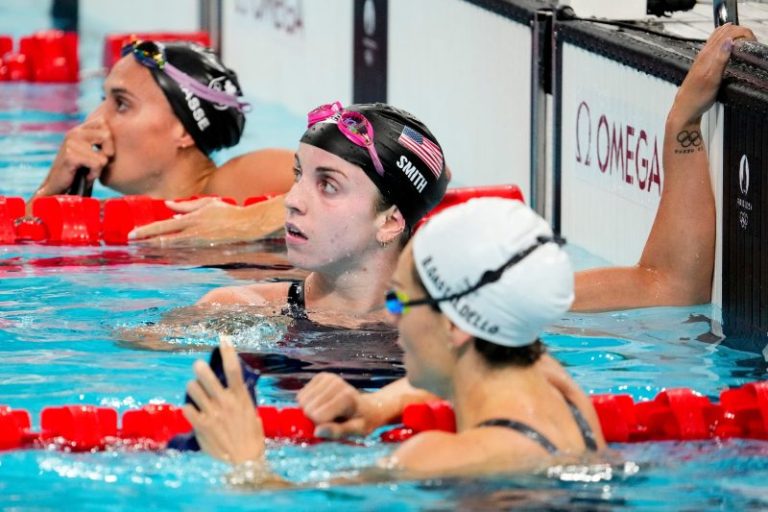 US women pile up 2 more medals in 100 backstroke