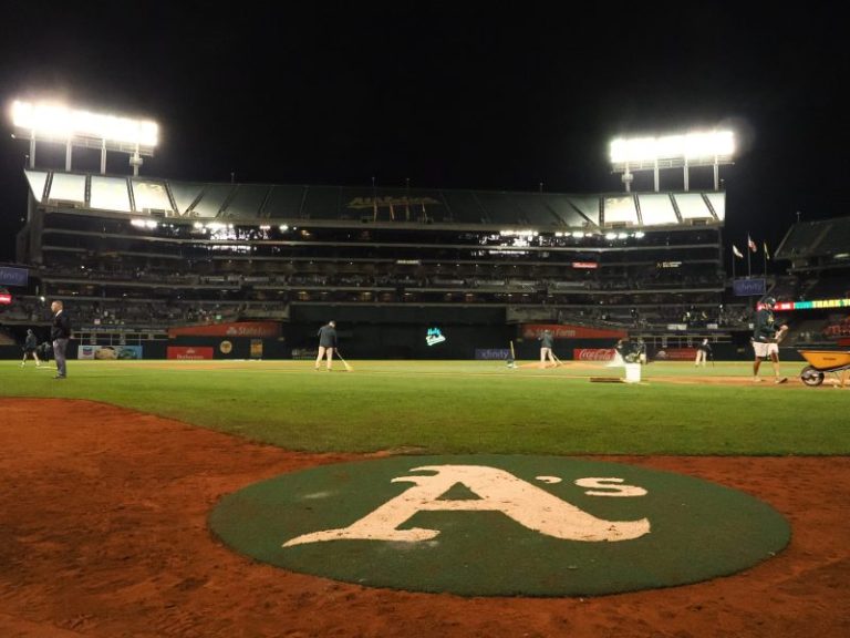 Watch: Grounds crew helps fans get souvenirs from Oakland Coliseum