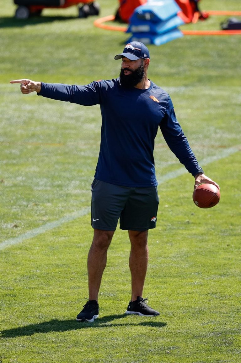 Broncos coach charged in airport incident, per reports