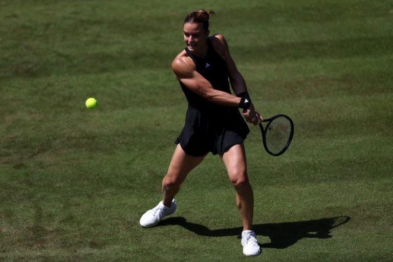 Tennis players exchange barbs at net, after match at Wimbledon tuneup